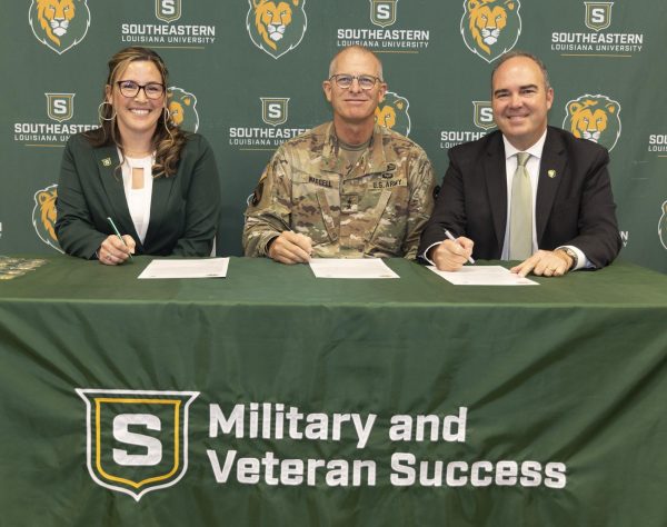 SOUTHEASTERN DECLARED PURPLE HEART SCHOOL - Southeastern Louisiana University was declared a Purple Heart School by the Military Order of the Purple Heart on Friday, Nov. 10. At the proclamation ceremony are, from left, Southeastern Director of Military and Veterans Success Emily Anthony, Major General Keith Waddell, and Southeastern President William S. Wainwright.